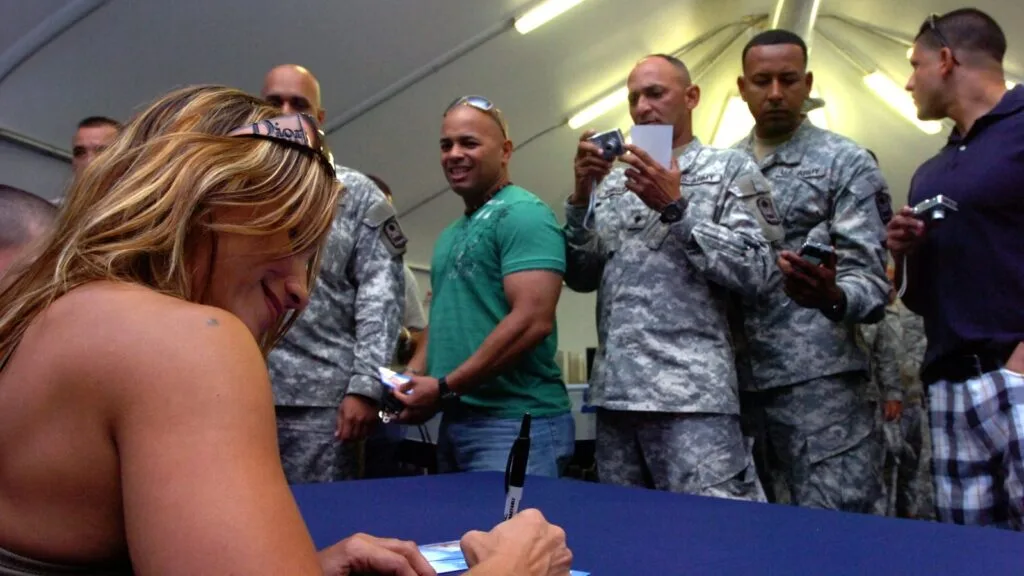Aspiring pop star signing music contract