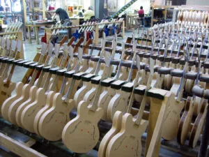 Inside a modern guitar manufacturing factory floor