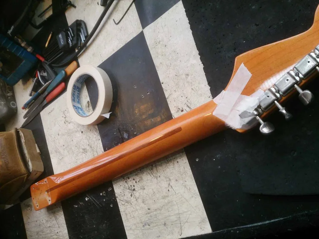 Sticky guitar neck before restoration treatment