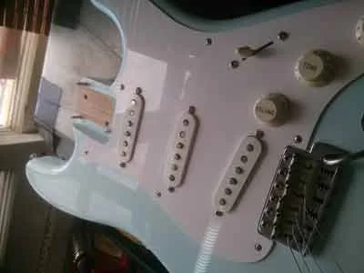 Separating the Stratocaster neck from the guitar body