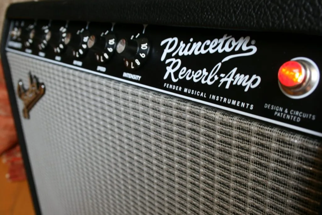 Silverface control panel grill cloth detail on a classic Fender Princeton Reverb guitar amplifier