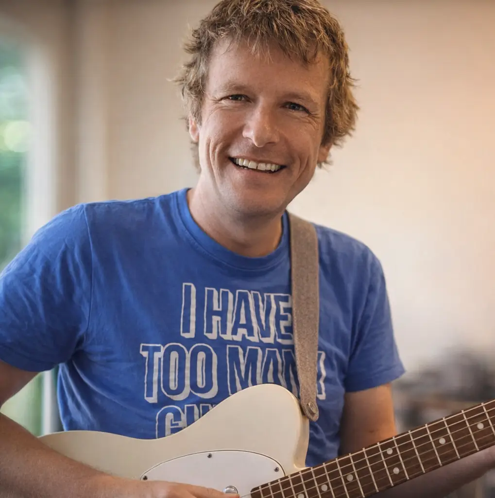 Simon Morel playing guitar in Sydney